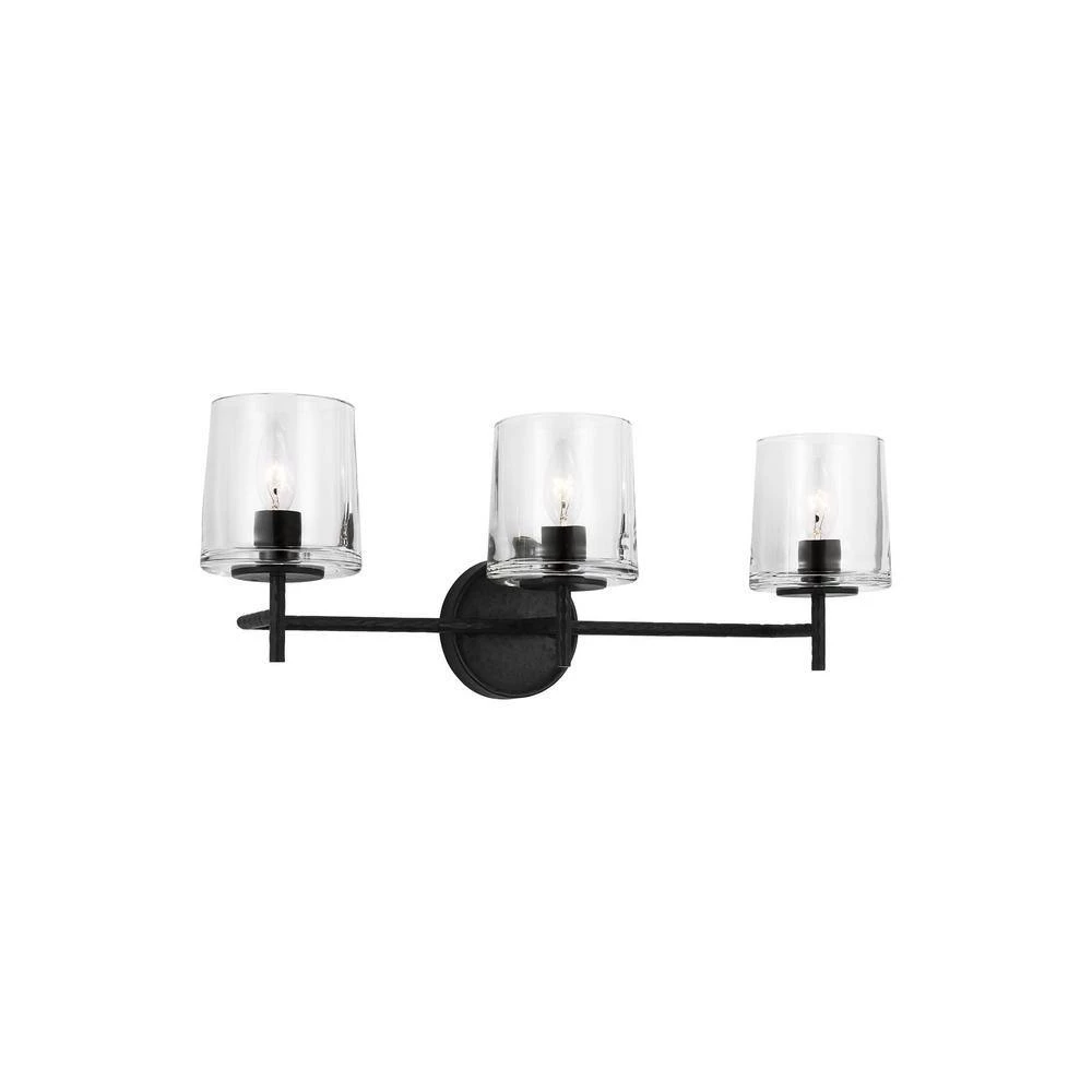 Marietta 24 in. 3-Light Aged Iron Bathroom Vanity Light with Clear Glass Shades by Generation Lighting Designer Collections 3 Marietta 24 in. 3-Light Aged Iron Bathroom Vanity Light with Clear Glass Shades by Generation Lighting Designer Collections