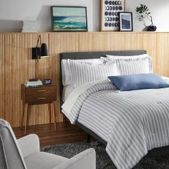 ED Ellen DeGeneres Crafted by Generation Lighting Simon 4.875 in. Matte Black Sconce with Burnished Brass Swivel Handle by Generation Lighting Designer Collections -Hot Sale Light Society Store matte black generation lighting designer collections vanity lighting ew1041mbk 1f 1000