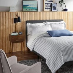 ED Ellen DeGeneres Crafted by Generation Lighting Simon 4.875 in. Matte Black Sconce with Burnished Brass Swivel Handle by Generation Lighting Designer Collections -Hot Sale Light Society Store matte black generation lighting designer collections vanity lighting ew1041mbk 4f 1000